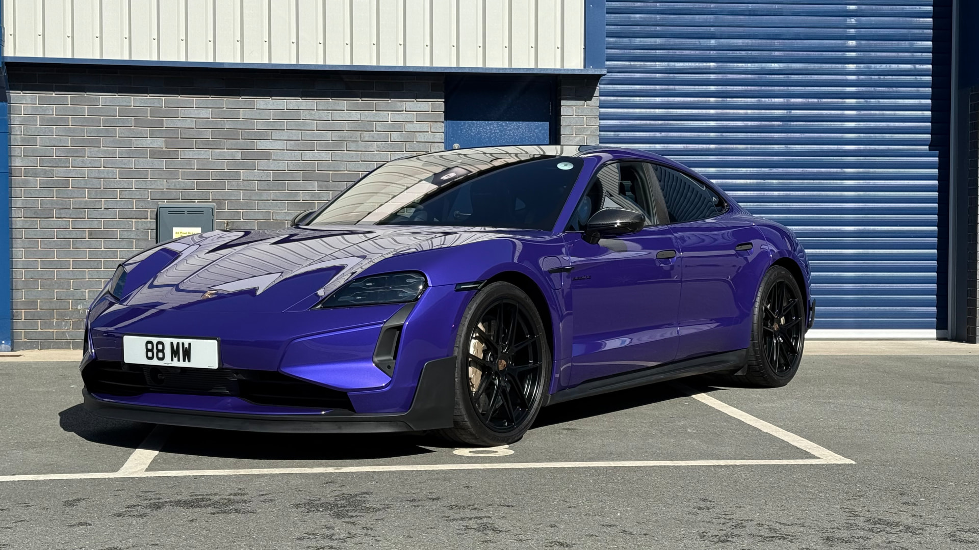 Purple Porsche Taycan after a New Car Protection Detail and ceramic coating